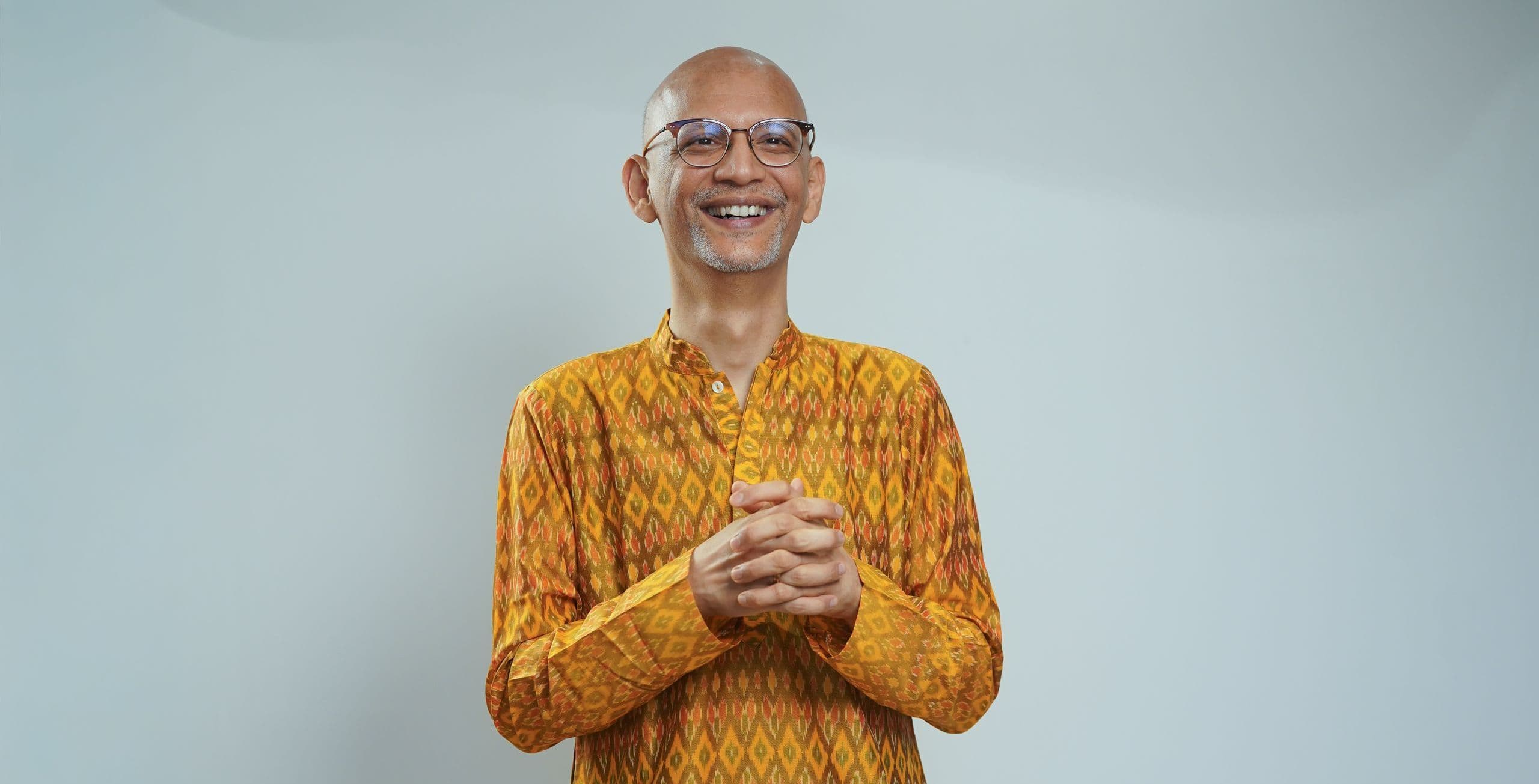 Ganesh in yellow kurta - laughing